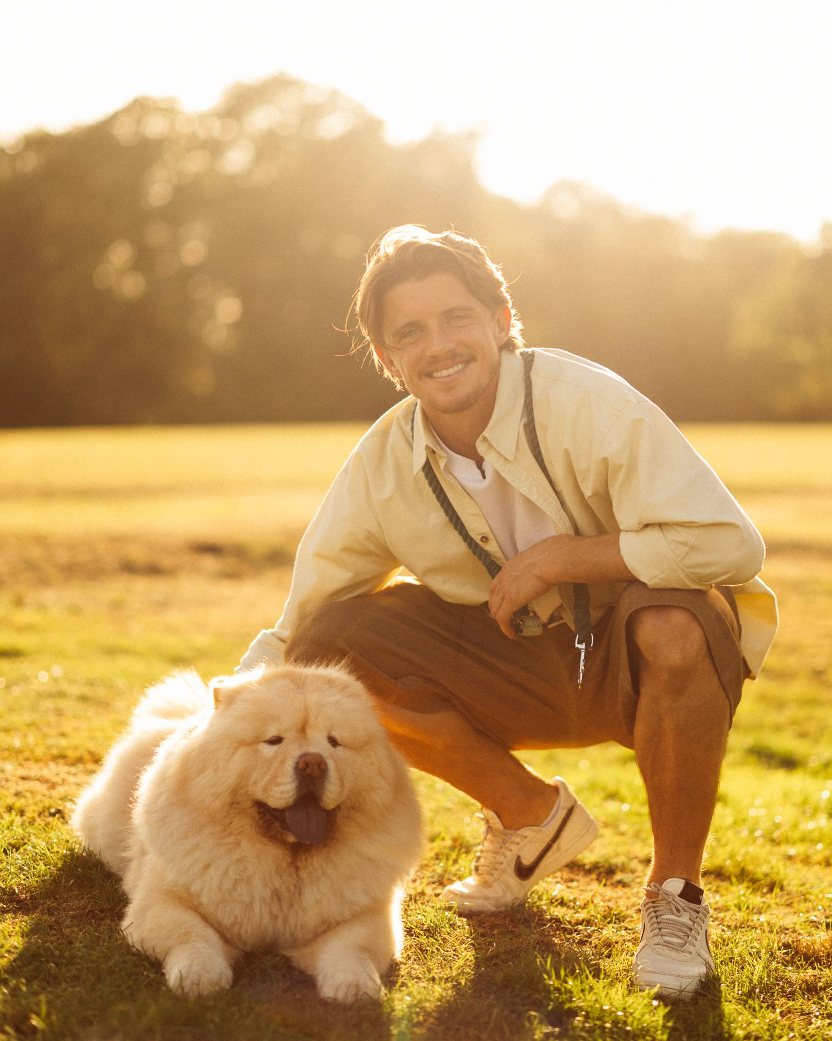 Conor Gallagher poses in the golden hour with his dog.