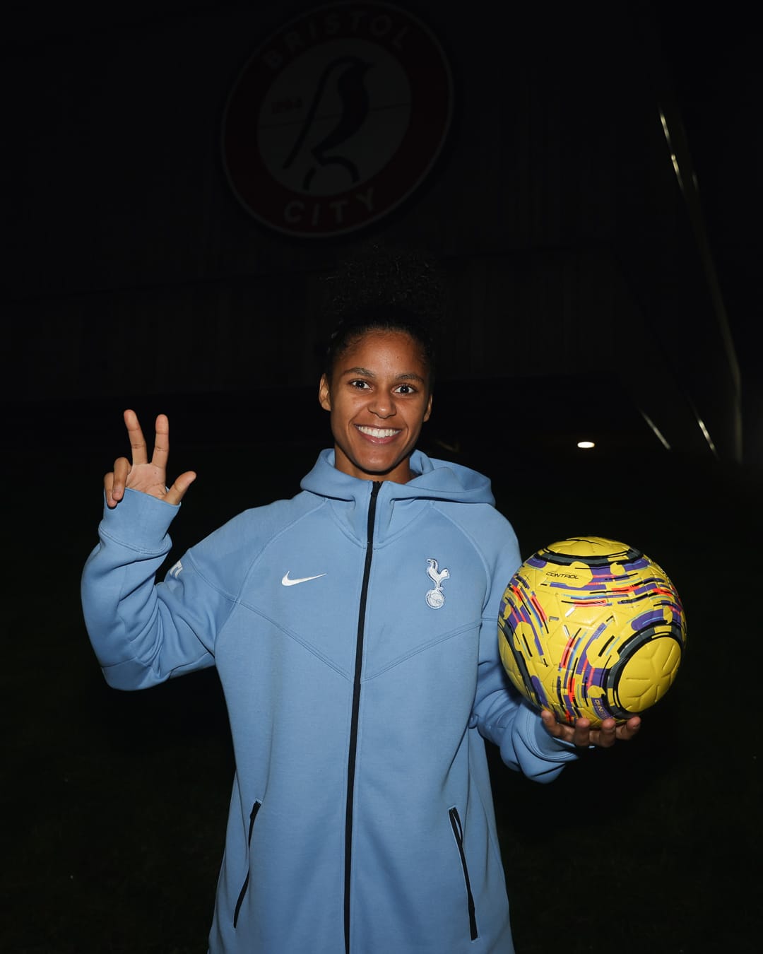Shekiera Martinez poses with the match ball, three fingers up to represent her hat trick.
