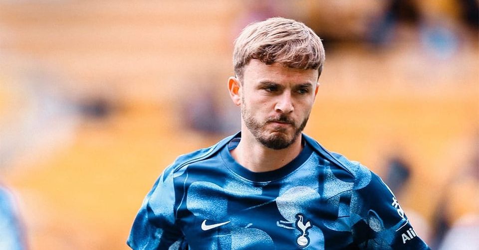 James Maddison frowns slightly during warmups.
