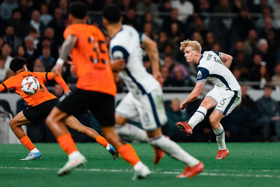 Lucas Bergvall strikes the ball past several players. 