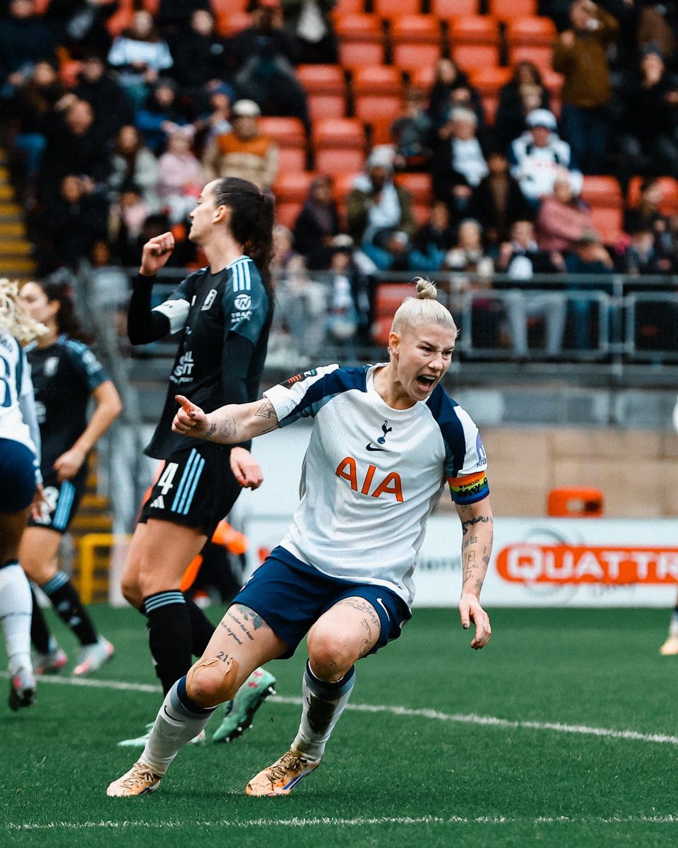 Beth England wheels away in celebration of an equalizer.