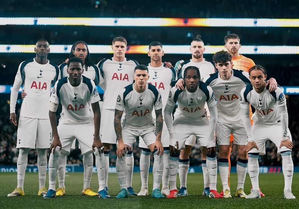 The starting lineup poses for a team photo.