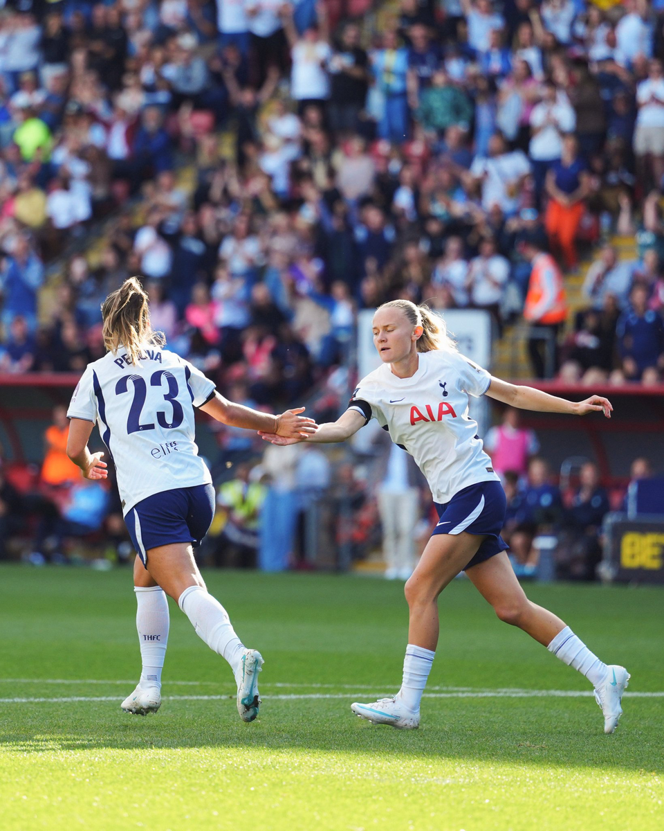Matilda Vinberg low fives Victoria Pelova.