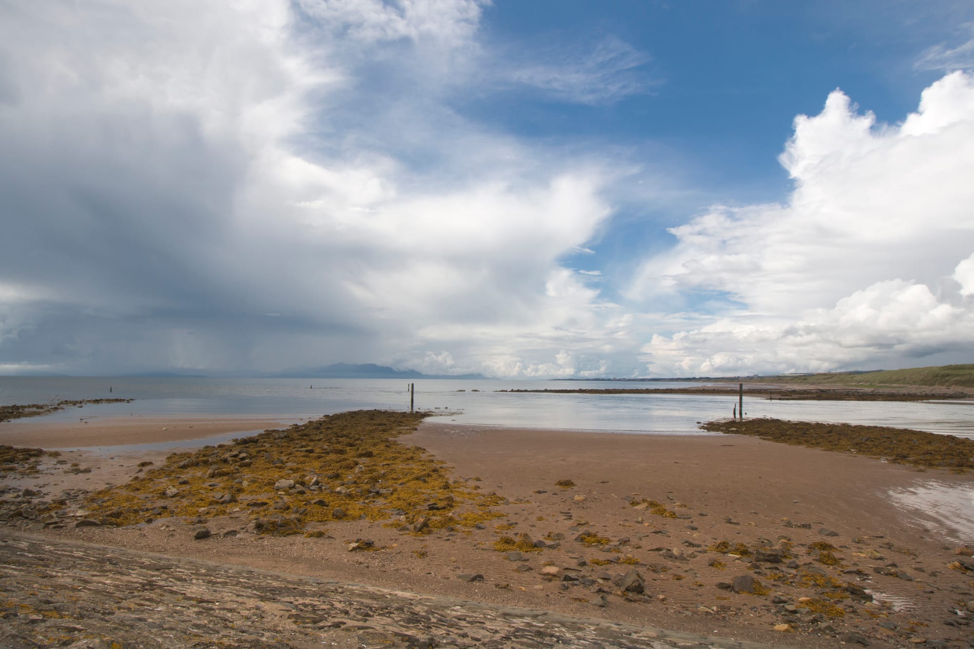 View from Irvine beach looking towards Arran. Sunshine with heavy showers moving in.