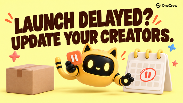 Yellow cat-ear robot holds a pause tile beside a sample parcel and calendar beneath the headline Launch delayed? Update your creators.