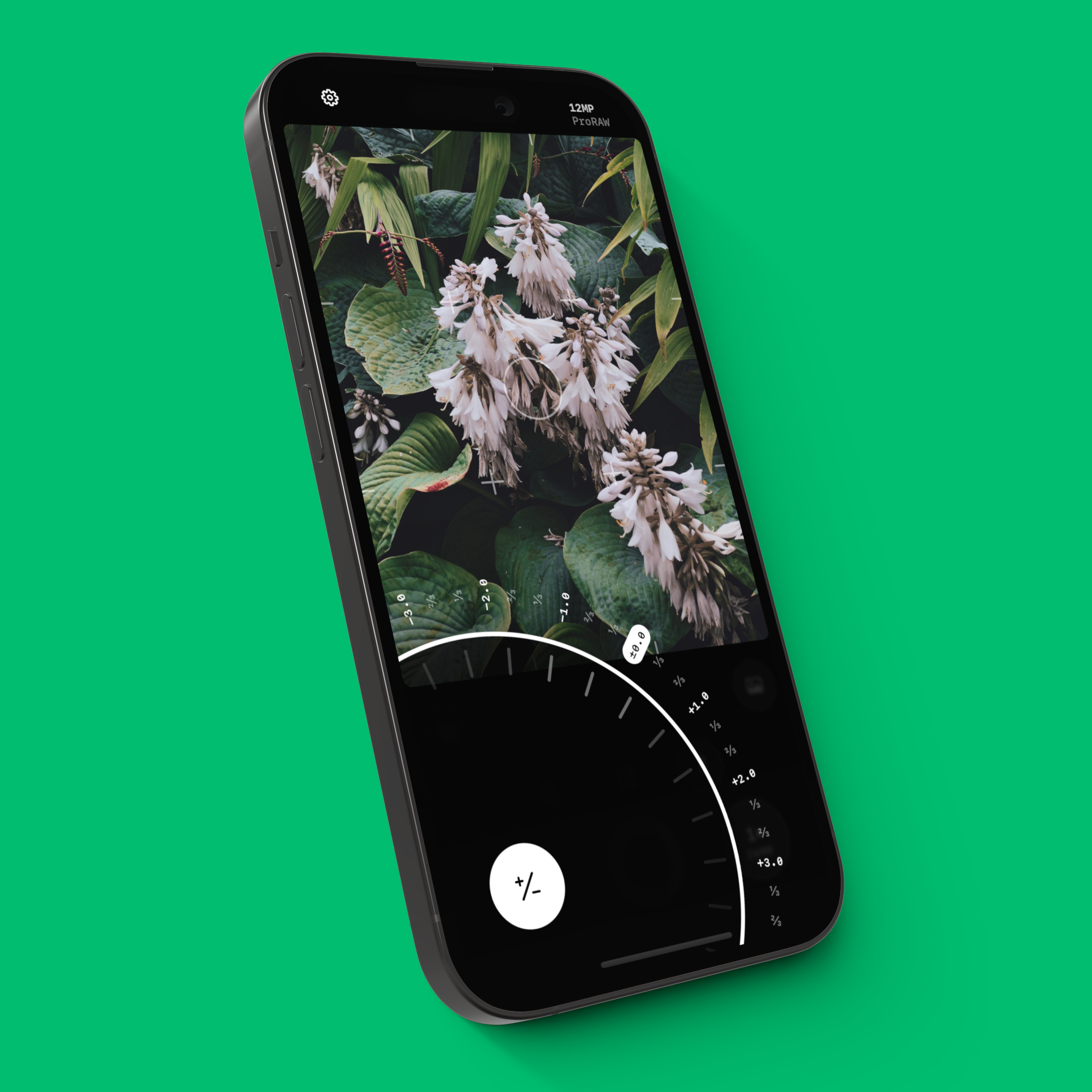 An iPhone 14 Pro showing Obscura’s Camera interface and the Exposure Dial over a green background.