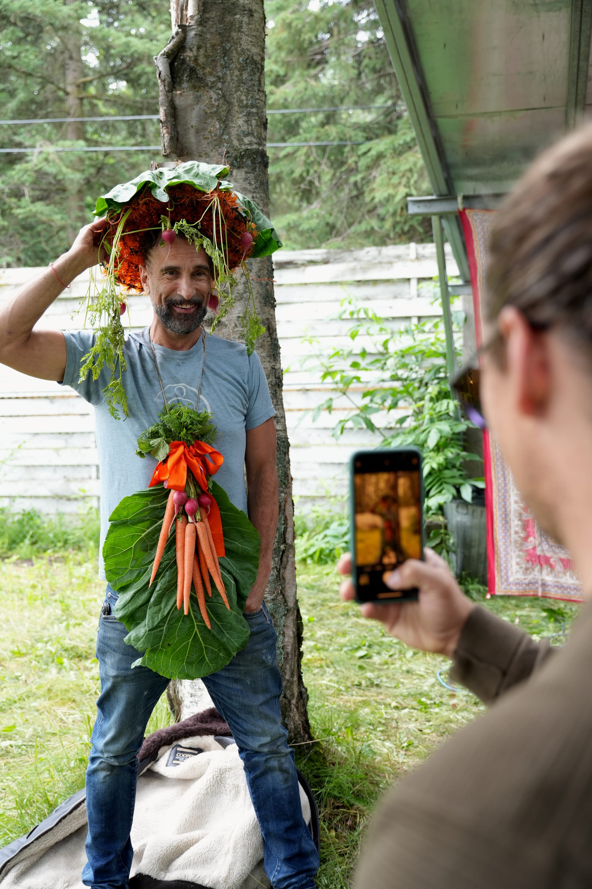 Markian Babij, the winner of this year's contest, wears his prize: veggie ornaments crafted by Alla Lushchyk. (Courtesy of Valerie Lake)