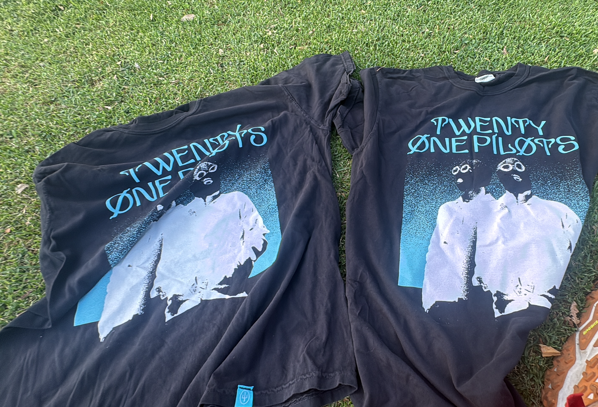 The Twenty One Pilots shirts pose for a photo in San Diego. (Nathaniel Herz/Anchorage Press)
