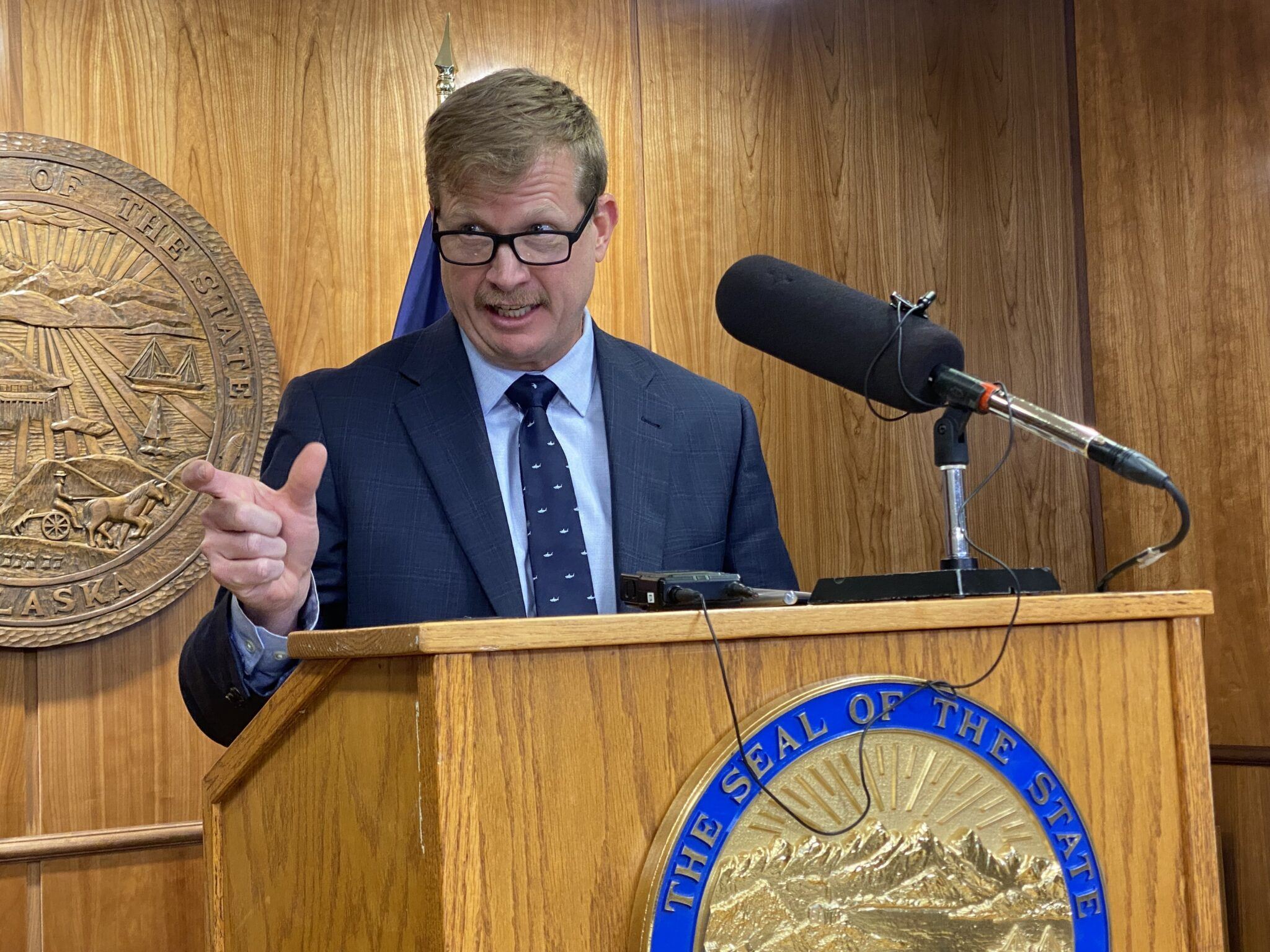 Pollster Matt Larkin speaks at a 2024 news conference organized by GOP Gov. Mike Dunleavy. (Claire Stremple/Alaska Beacon)