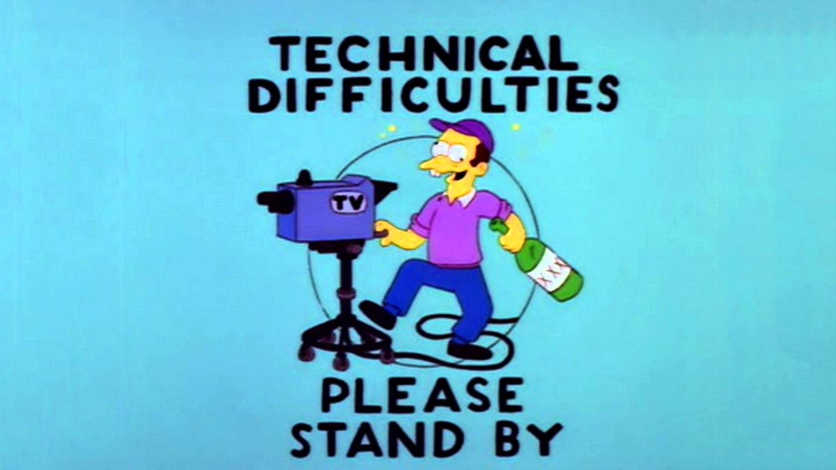 A screenshot of The Simpsons, with a picture of a drunk cameraman under text reading "Technical difficulties please stand by"