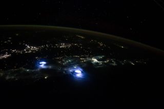 Night approach to Singapore from the ISS