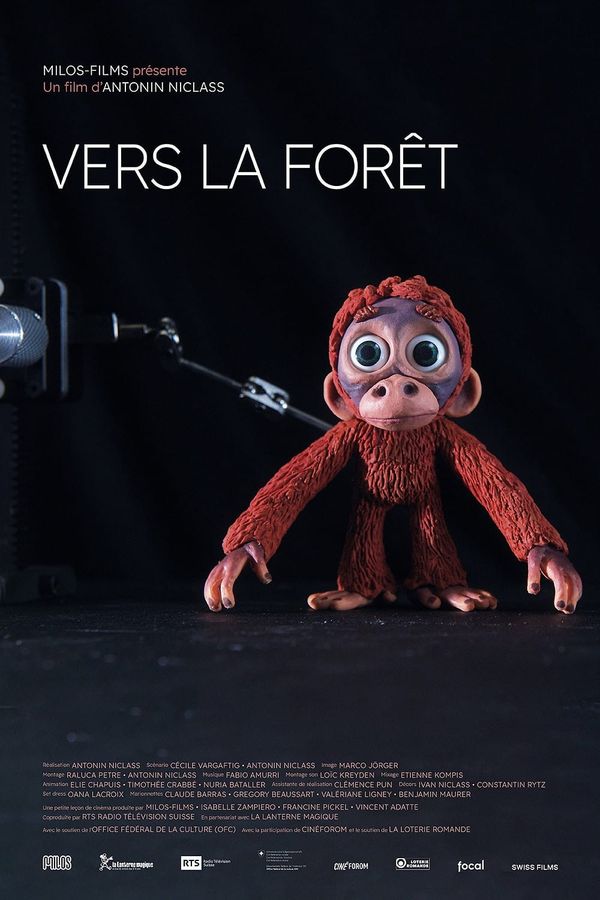 A small red clay monkey beside a stop-motion camera rig on the poster for Antonin Niclass's short Into the Forest