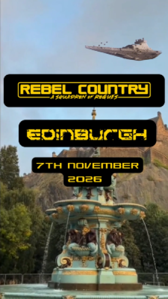 Something similar to a Star Destroyer looming over Edinburgh Castle with the Ross Bandstand in front of us. info text on Rebel Country is on image in yellow font with black background