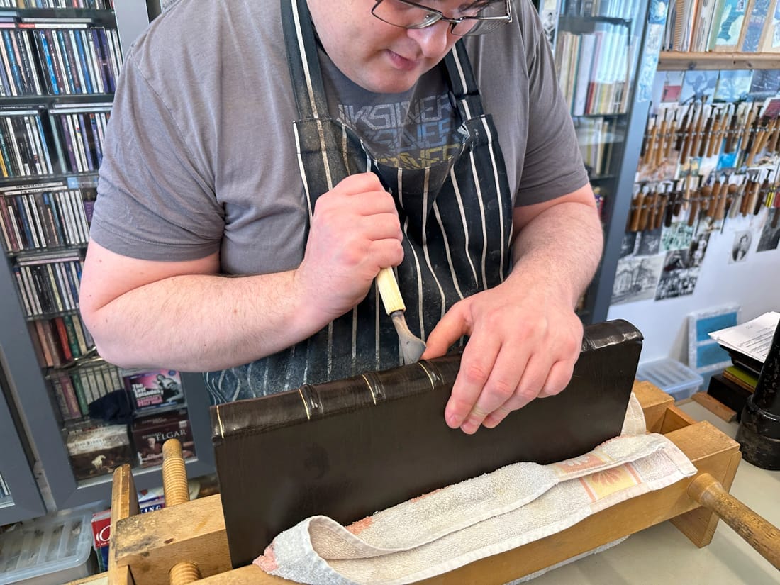 Adam the bookbinder photographed through Member Powered Photography