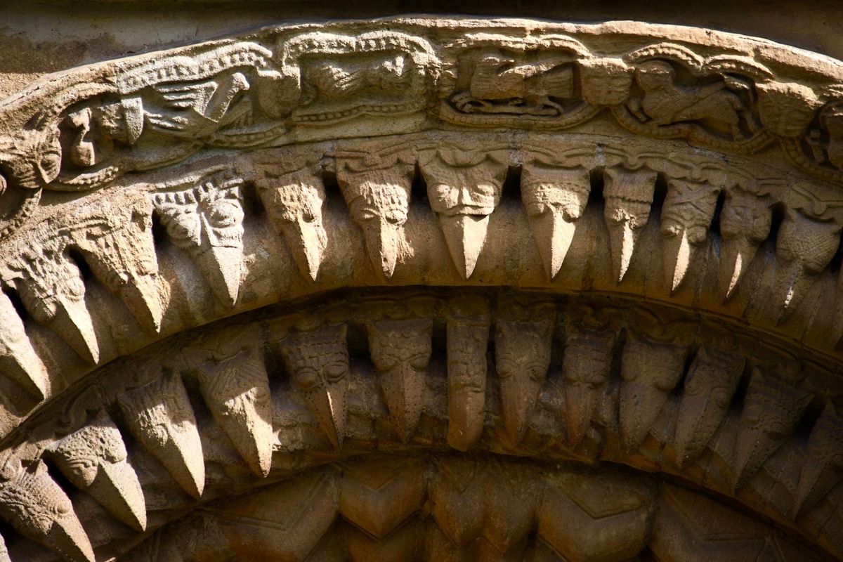 Close view of expressive medieval stone carving