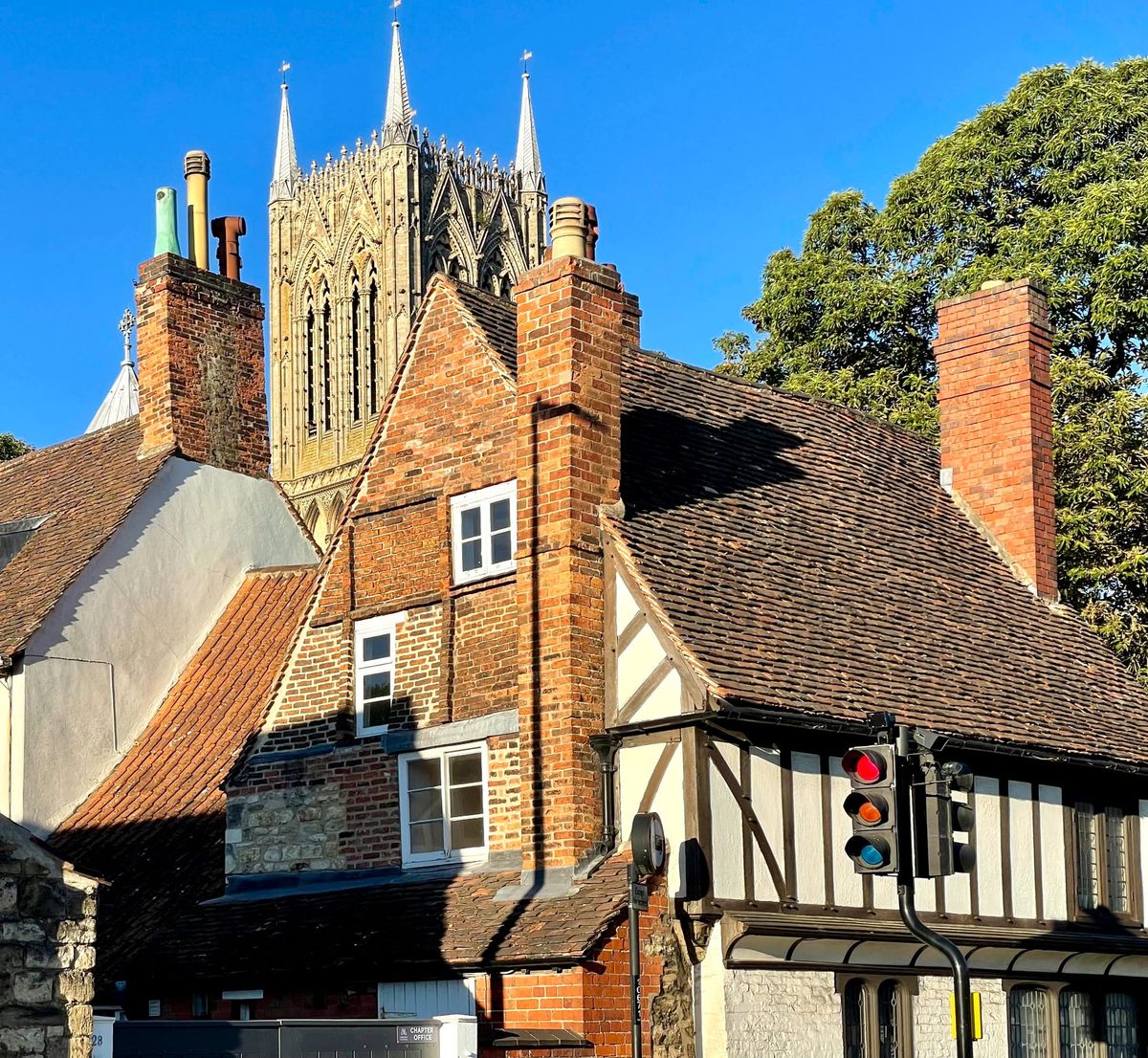 Lincoln Cathedral rising above the layered roofs of the city