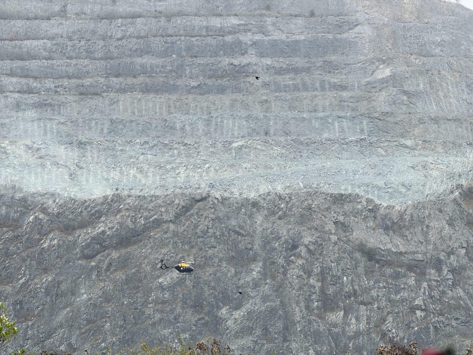 Behind The Photograph: The rescue helicopter and the wounded hill.