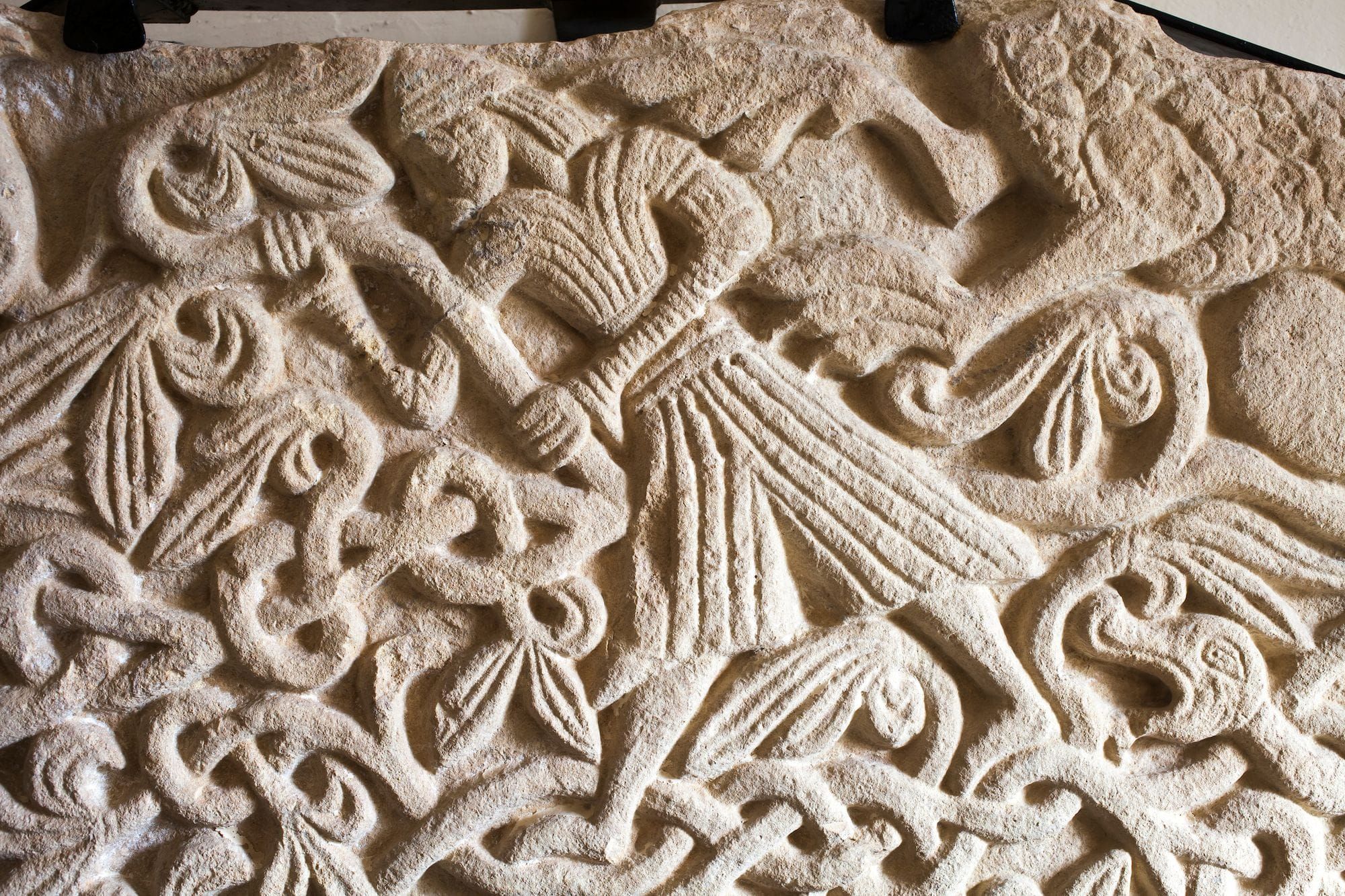 Norman tympanum and Saxon style carving at All Saints, Billesley