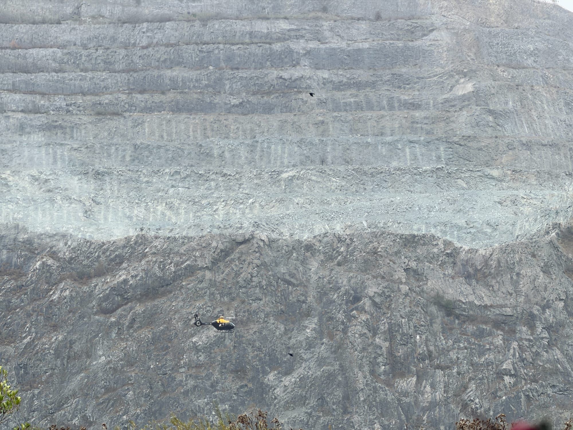 Behind The Photograph: The rescue helicopter and the wounded hill.