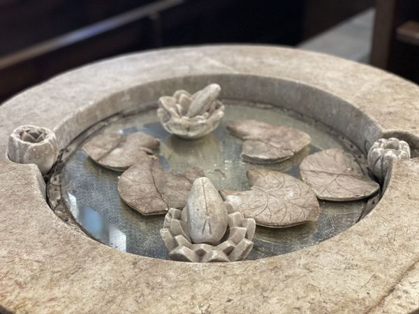 The naturalistic carved font at St. Mary, Wreay