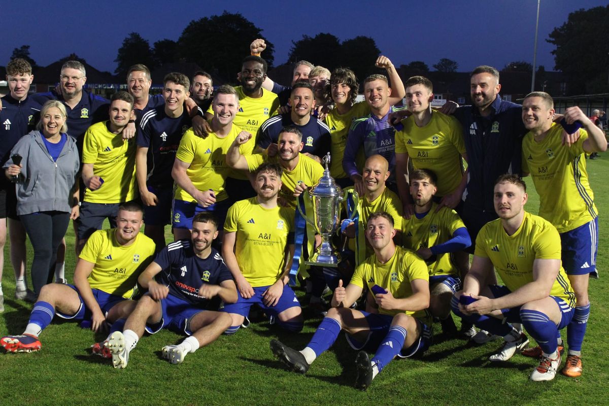 CMB lift the Bolton Hospital Cup after defeating Daisy Hill