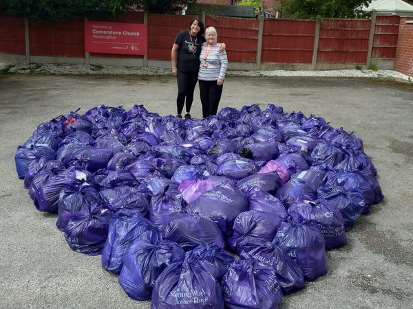 Catherine Cleary and Daisy Hill slimmer Lynne with all the donated clothes