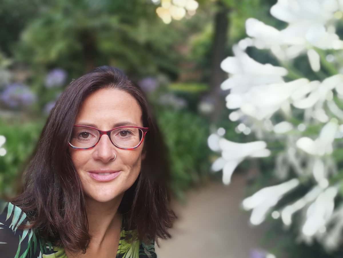 Michela Osnato looking into the camera with a serious I'm here to talk about Science expression.