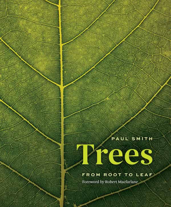 The cover of Trees by Paul Smith. The image is a close-up of a leaf with the largest vein running up the cover roughly in proportion with the golden ratio. The close view and contrast of the smaller veins give it an almost leathery look.