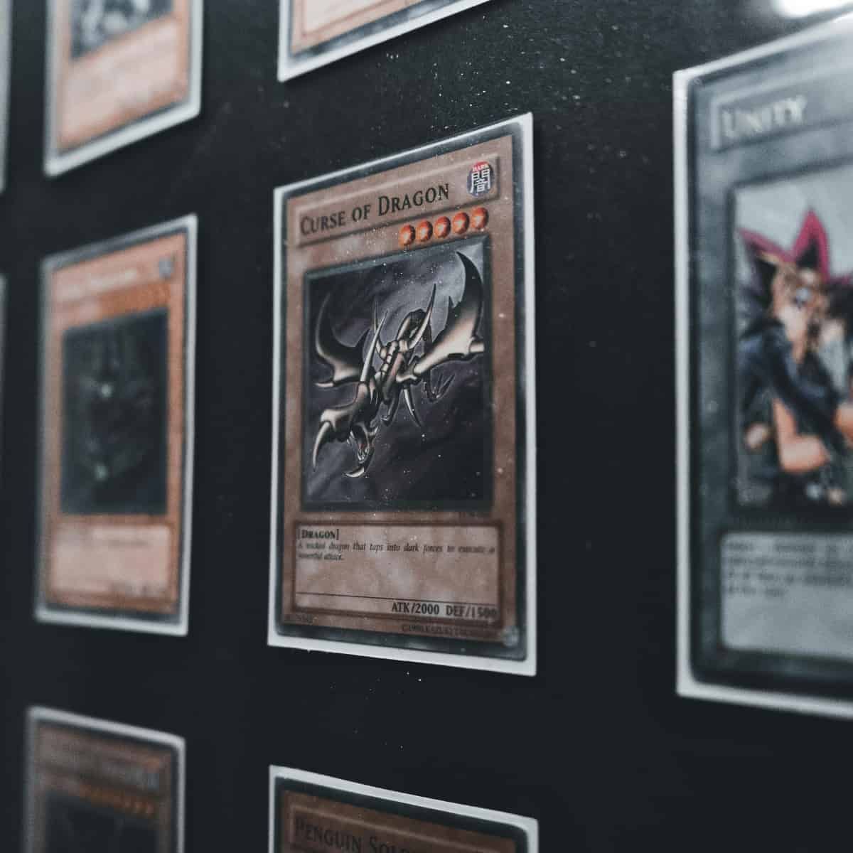 Trading cards mounted on a wall