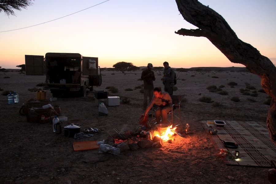 Cooking over a fire.
