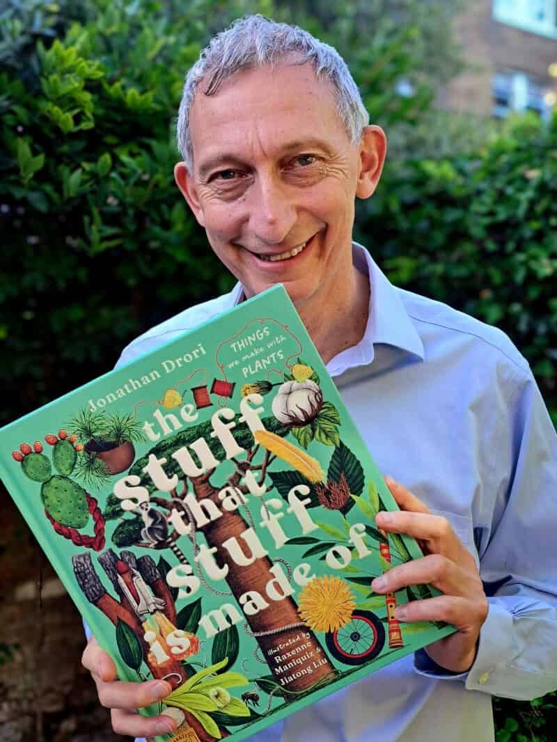 The author, Jonathan Drori, with a copy of his book.