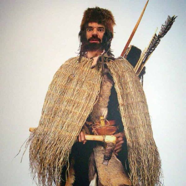 A waxwork of a man in chalcolithic clothing.