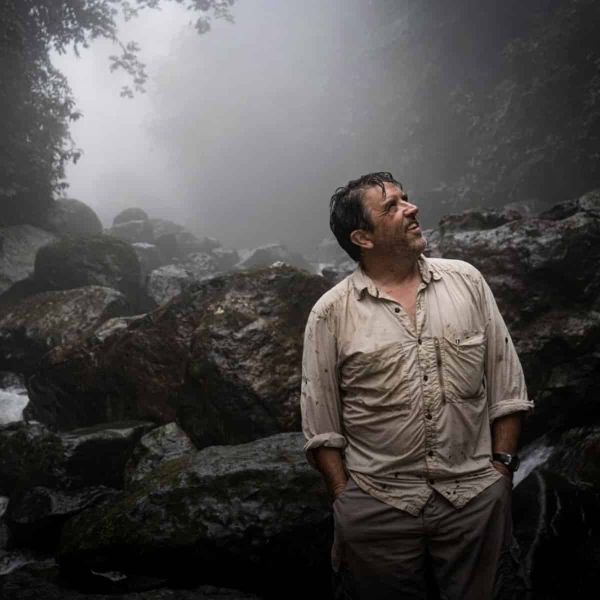 A botanist stares in wonder at the Ecuadorian rainforest.