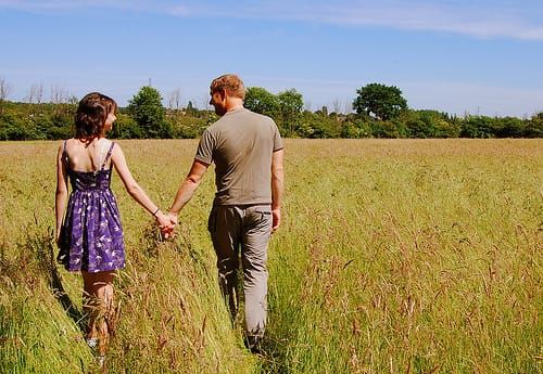 Couple holding hands