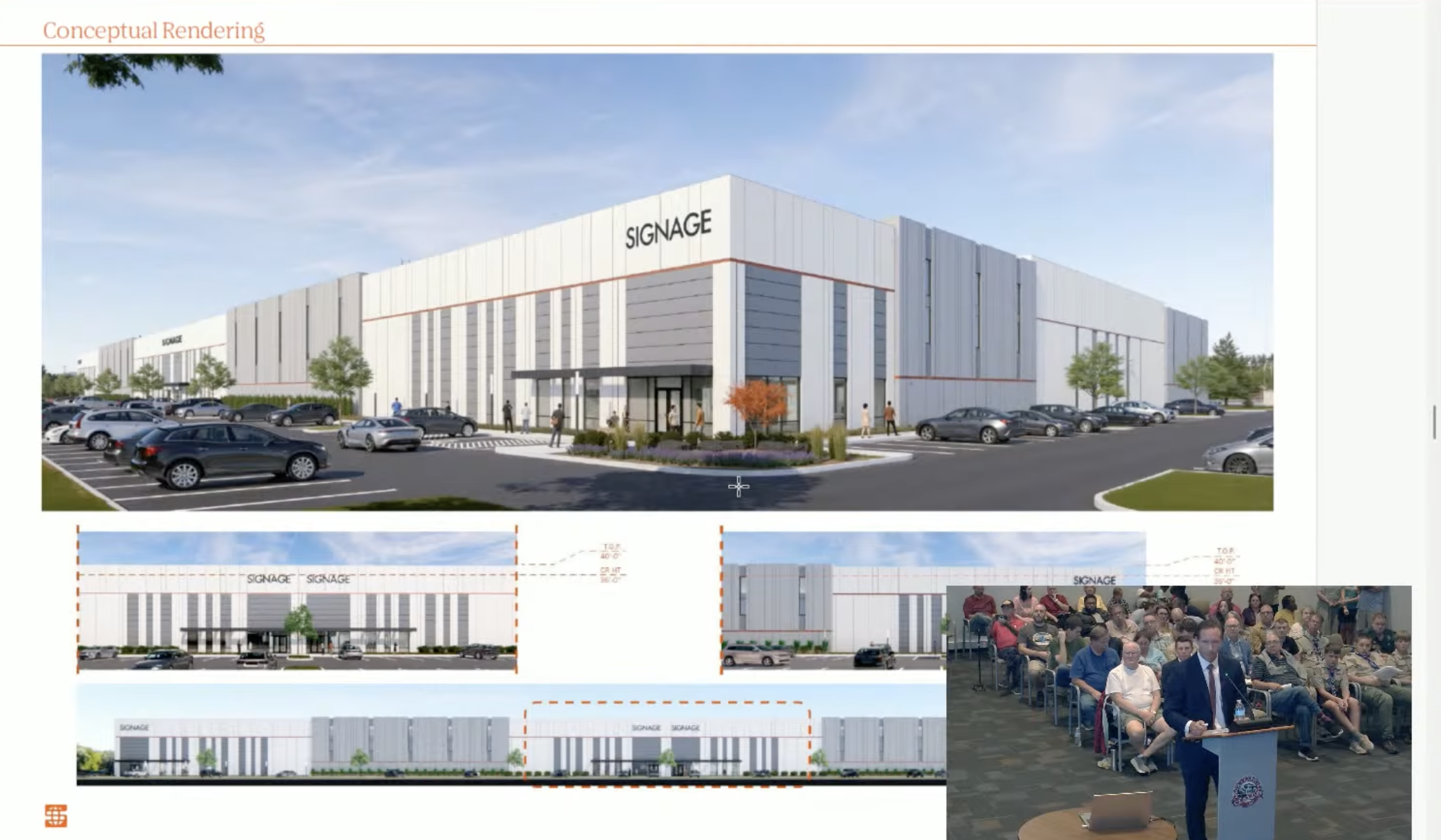 Screenshot of a Town Council presentation showing a conceptual rendering of a large white industrial warehouse with gray panels, office entrances, landscaping and a parking lot filled with cars. Smaller architectural elevations appear beneath the main rendering. In the lower-right corner, an inset video shows a man speaking at a podium before a crowded Council chamber.