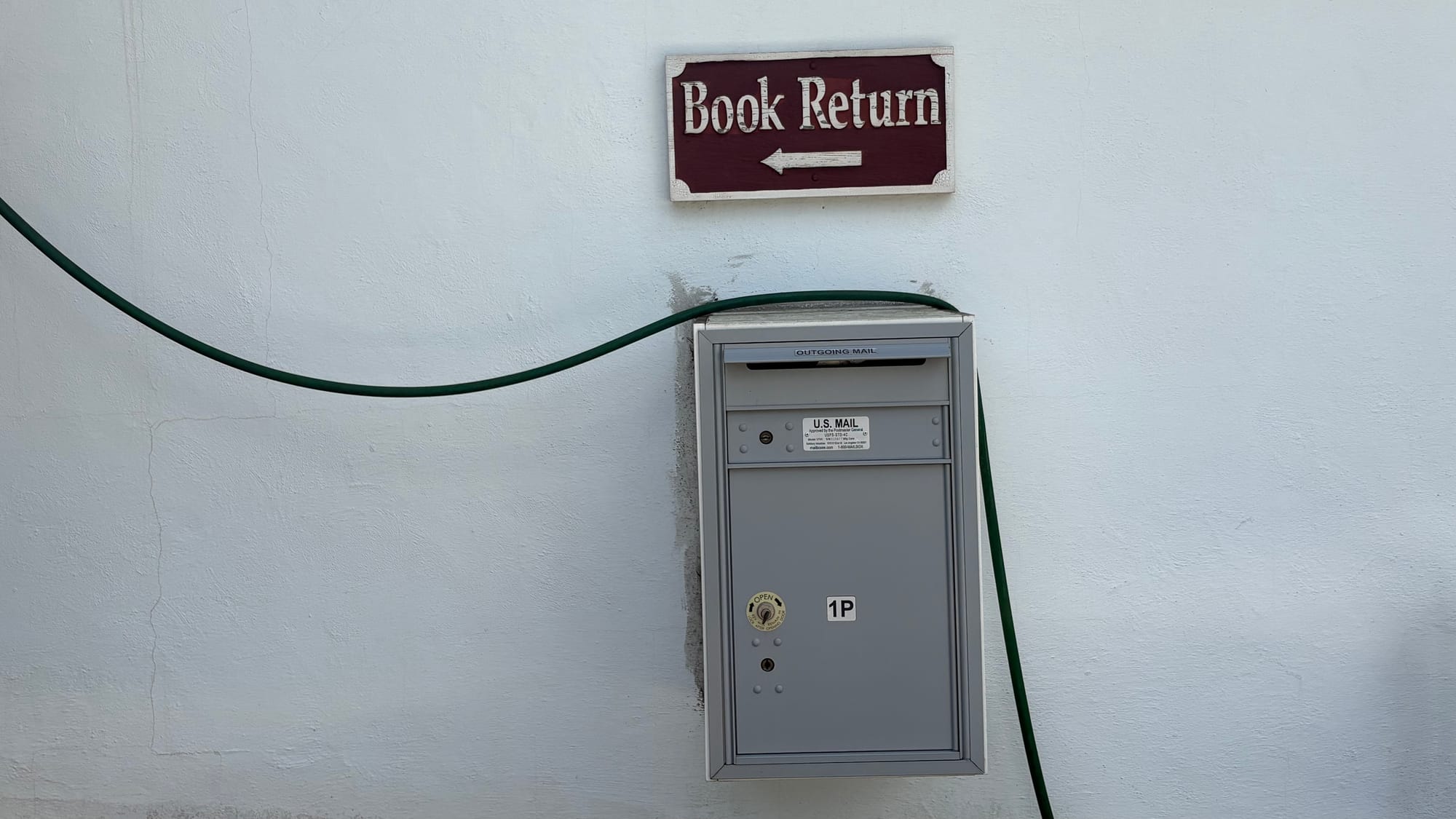 Photograph of the Book Return sign by Middletown Observer.