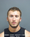 Outstanding Warrant Arrest Leads to Invasion of Privacy Charge