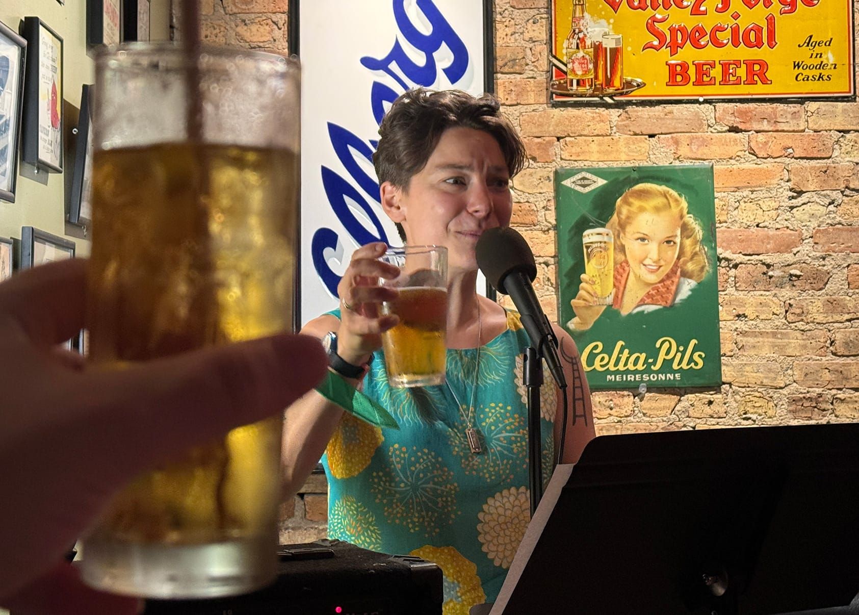 Tuesday Funk cohost Erin Watson giving a toast