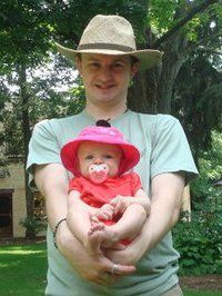 Connor Coyne holding baby Mary Adelina