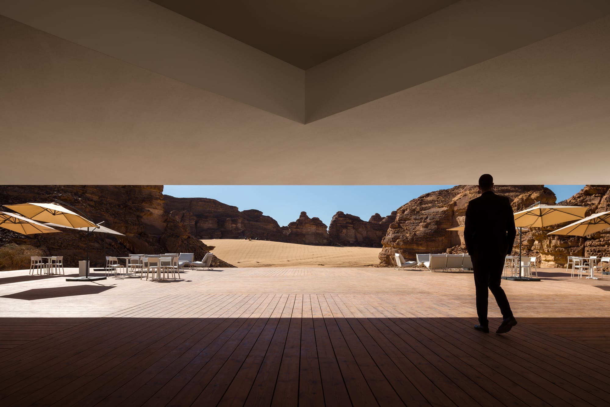 A panoramic view looking out from the Desert X 2024 visitor center in AlUla, Saudi Arabia. Architecture by kwy.studio. 