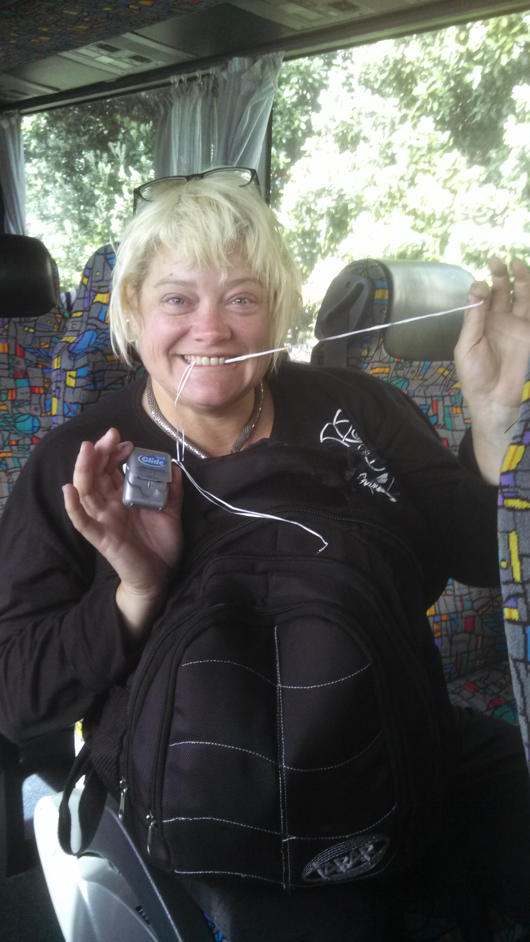 me sewing my bag with dental floss