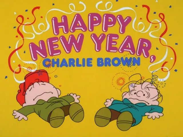The opening credit from Happy New Year Charlie Brown, with Charlie Brown and Linus lying down, dazed, stars over their heads.