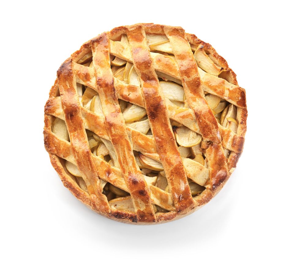 an apple pie with a ribbon crust