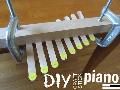 from http://wefollowpics.com/diy-craft-stick-piano-this-homemade-instrument-comes-together-in-5-minutes-and-guarantees-an-hour-of-musical-enjoyment-for-kids-of-all-ages/