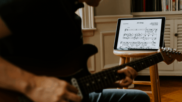 benefits of reading guitar sheet music
