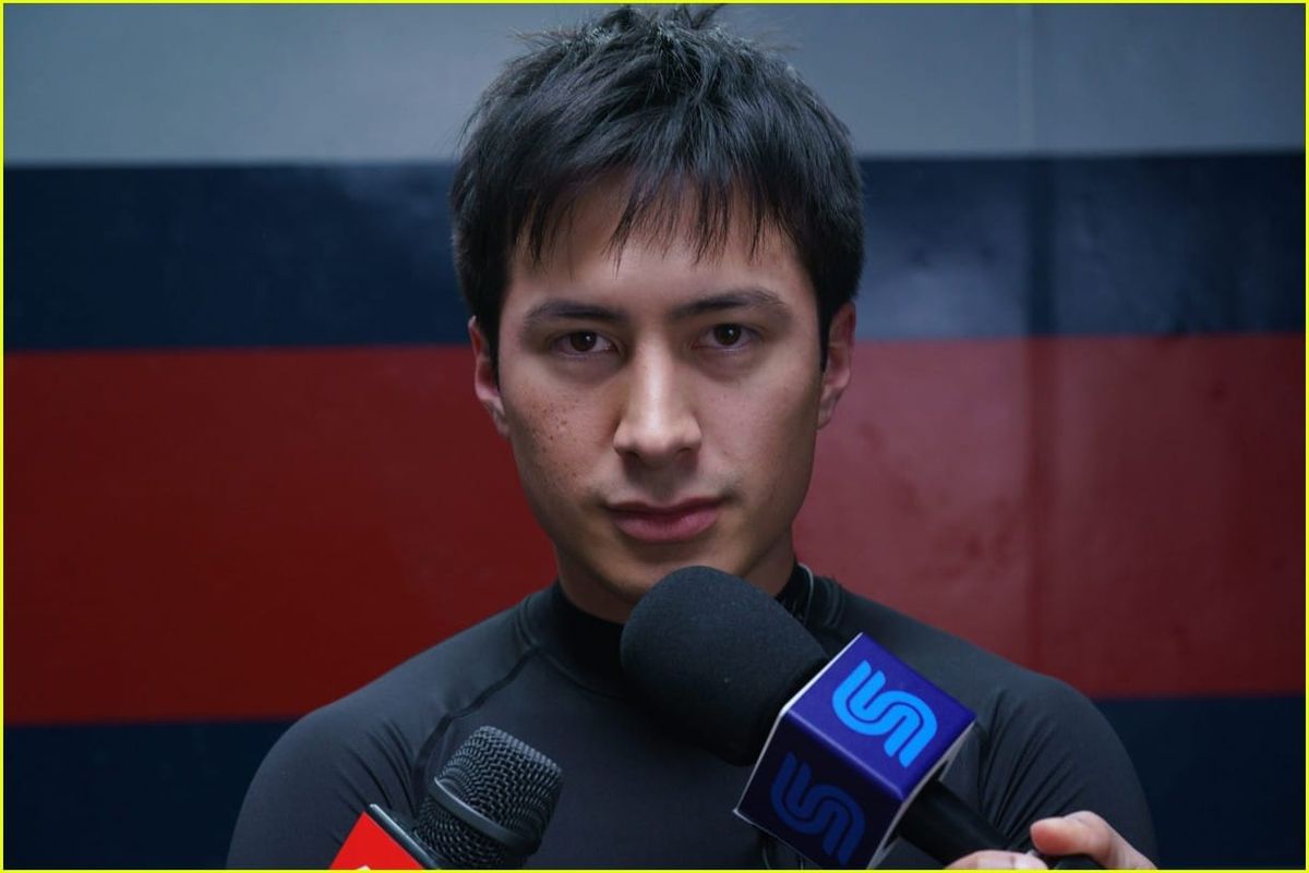 A still of Shane Hollander looking at the viewer while being interviewed