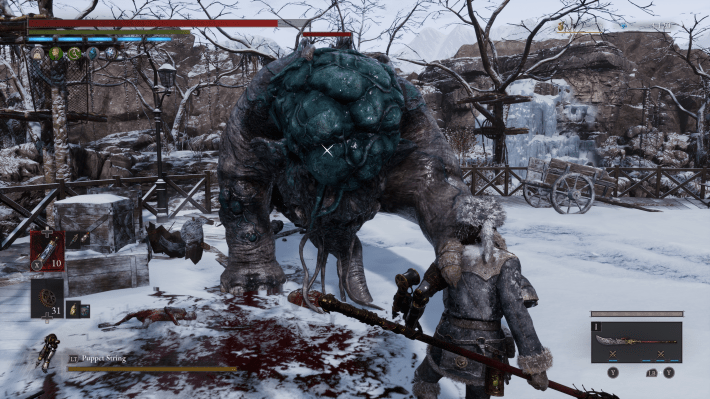 P fighting a disgusting horse-elephant hybrid with a growth on its head.