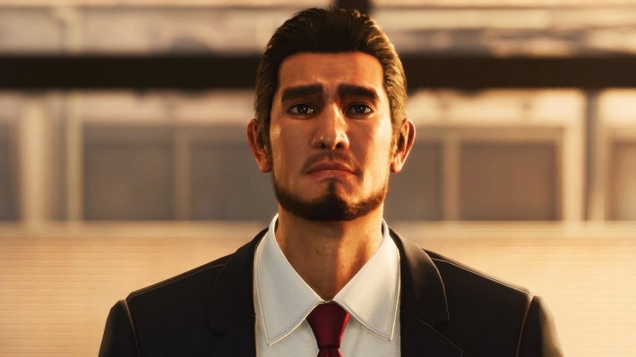 Like A Dragon: Infinite Wealth screenshot of Ichiban Kasuga leaving work after getting laid off.