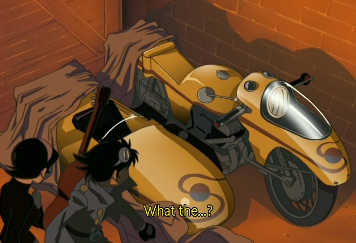 Jiro and Mitsuko staring at a sidecar motorcycle hidden under a tarp in their burning garrage. 