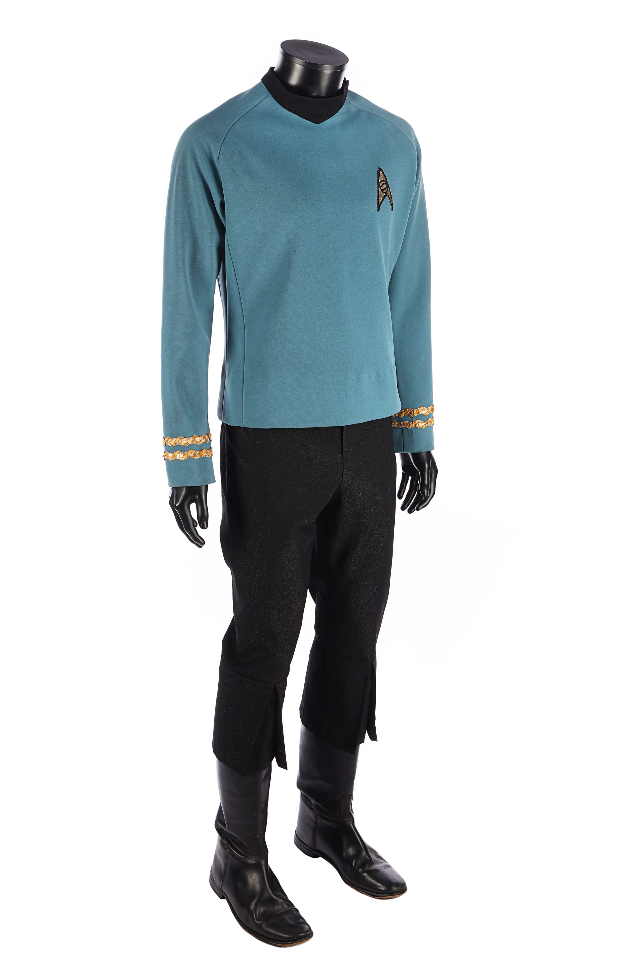 Leonard Nimoy's unused TOS uniform update for the aborted sequel series STAR TREK II, which became THE MOTION PICTURE. The dead giveaway is the large pant cuffs with slit and the taller ribbed black collar on the tunic. 